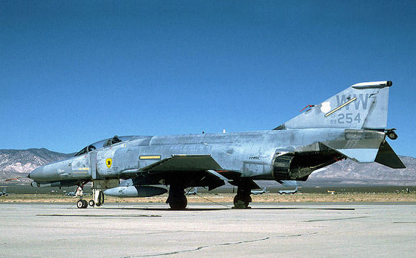 McDonnell Douglas F-4E-43-MC Phantom II AF Serial No. 69-7254/WW in F-4G configuration awaits its turn at Mojave for conversion to a 'Red Tail' Full Scale Aerial Target (FSAT) drone. White fin cap indicates aircraft was assigned to the 563 TFS, inactivated October 1989. Converted to QF-4G AF-209. Expended as target 4 June 2002.