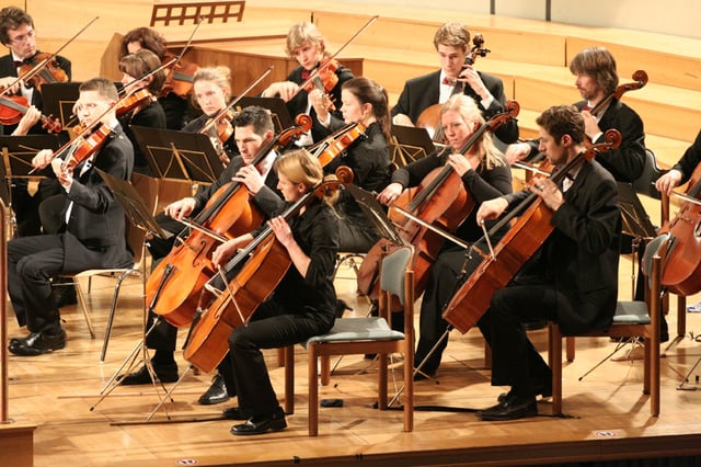 The cello section of the orchestra of the Munich University of Applied Sciences