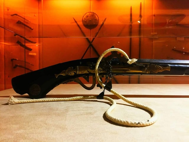 The trigger mechanism of an Istinggar, a classical Malay gun as displayed in Muzium Warisan Melayu (Malay Heritage Museum), Serdang, Selangor. Upon the Fall of Malacca in 1511, it was recorded by Tomé Pires that the Portuguese conquistadors managed to seized 3000 bronze and iron cannons and thousands of Istinggar guns from the capital.