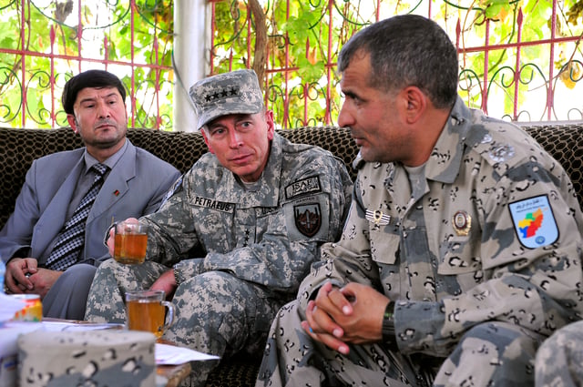 Petraeus having tea with the Afghan Border Police Commander at the border with Uzbekistan