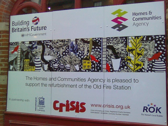 Refurbishment notice at Old Fire Station, Oxford, showing HM Government support.