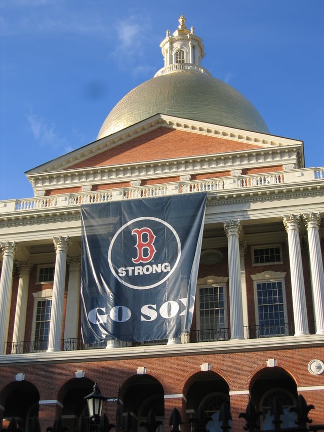 The Massachusetts State House displaying a banner in honor of the Red Sox's 2013 World Series appearance