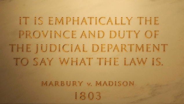 Inscription on the wall of the Supreme Court Building from Marbury v. Madison, in which Chief Justice John Marshall outlined the concept of judicial review