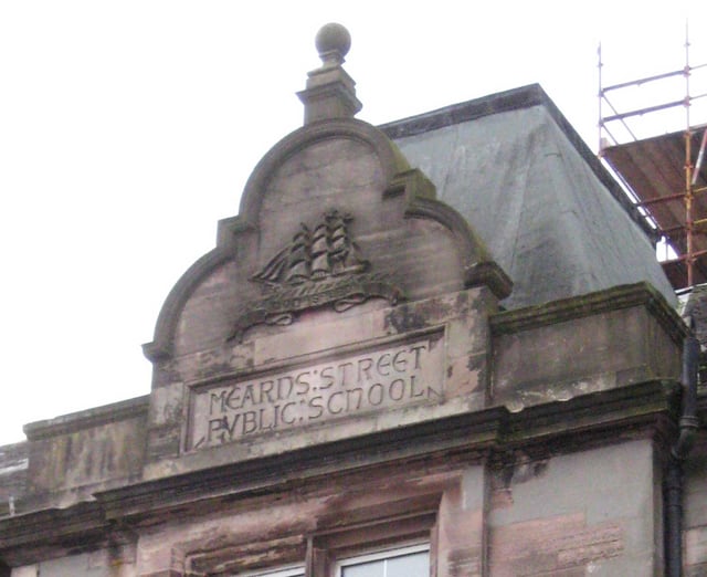 Pediment above entrance showing name of Mearns Street Public School, built for Greenock Burgh School Board.