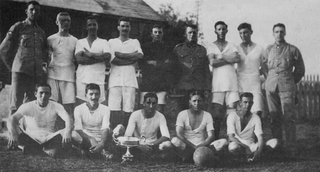 The football team of 95 Company, Royal Garrison Artillery, victors in the 1917 Governor's Cup football match, pose with the cup. The cup was contested for annually by teams from annually by teams from the various Royal Navy, British Army Bermuda Garrison, and Royal Air Force units stationed in Bermuda.