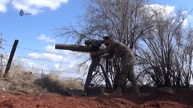 An Army of Glory fighter launches a BGM-71 TOW anti-tank missile at a Syrian government position during the 2017 Hama offensive.
