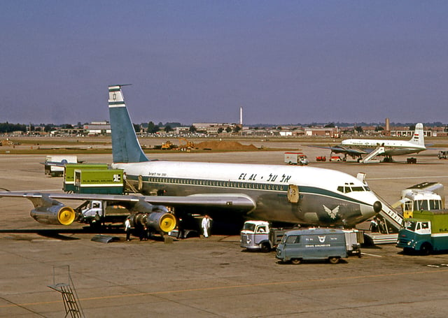 An El Al Boeing 720 being serviced at London Heathrow Airport in 1964.