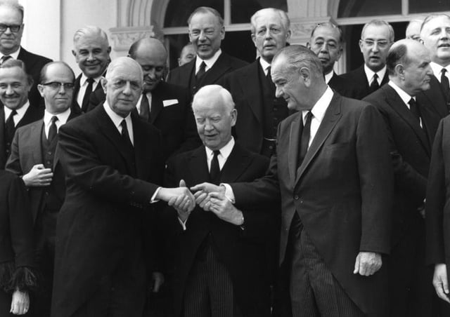 De Gaulle and Lyndon B. Johnson meeting at Konrad Adenauer's funeral in 1967, with President of West Germany Heinrich Lübke (center)