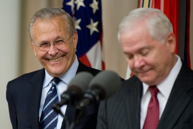 Rumsfeld shares a laugh with his successor, Robert Gates, at a ceremony to unveil his official portrait as Secretary of Defense, June 25, 2010