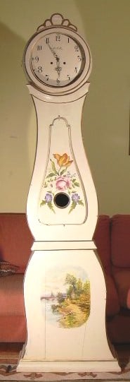 A Mora clock dating from 1834, with later painting on the case