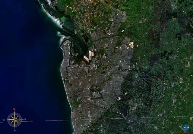 Satellite image of Adelaide's metropolitan area. The Adelaide Hills is the green area to the right of the Adelaide plains.