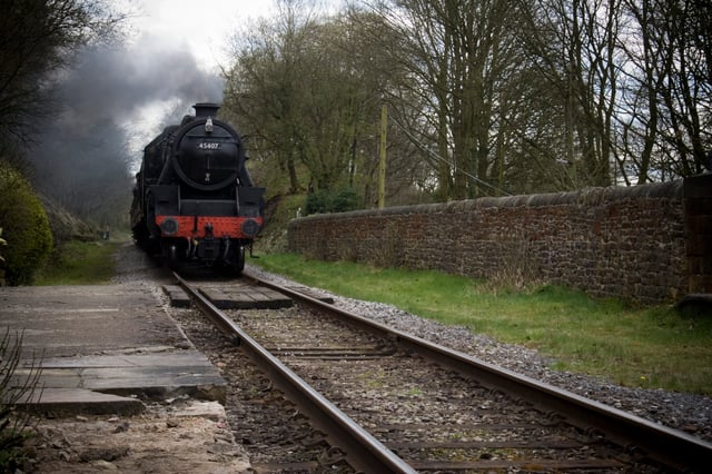 LMS Stanier Class 5 4-6-0 45407 approaching Summerseat station on the heritage East Lancashire Railway