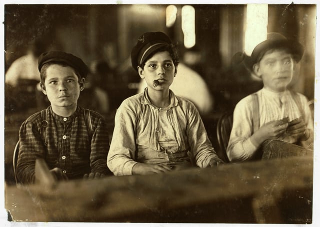 Child labor at a cigar factory, 1909. Photo by Lewis Hine.