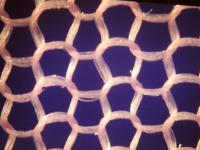 Close-up photograph of the knitted nylon fabric used in stockings