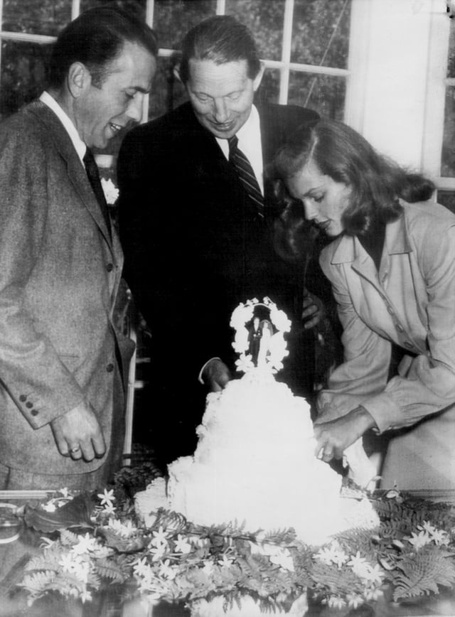 Best man Louis Bromfield (center) at the wedding of Humphrey Bogart and Lauren Bacall at Malabar Farm (May 21, 1945)
