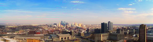 A panoramic view from the top of Liberty Memorial looking west toward Kansas, with downtown to the right and the National WWI Museum located below the Liberty Memorial Monument.