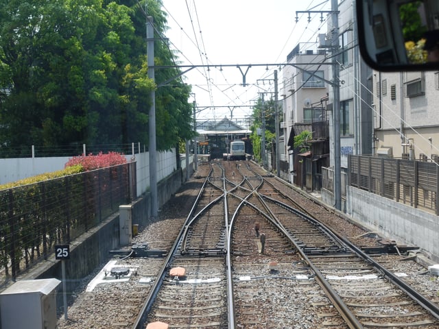 A scissors crossover: two pairs of switches linking two tracks to each other in both directions