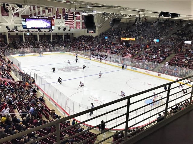 An ice hockey game played at "Kelley Rink," Conte Forum.