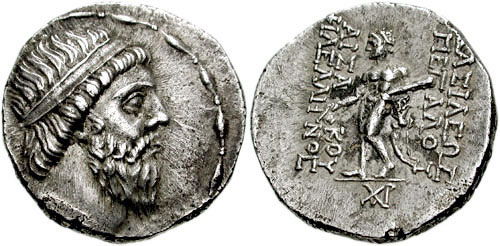 Drachma of Mithridates I of Parthia, showing him wearing a beard and a royal diadem on his head. Reverse side: Greek inscrirption reading ΒΑΣΙΛΕΩΣ ΜΕΓΑΛΟΥ ΑΡΣΑΚΟΥ ΦΙΛΕΛΛΗΝΟΣ "of the Great King Arsaces the Philhellene"