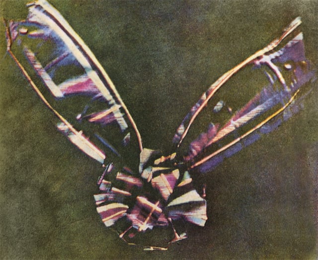 The first color photograph made by the three-color method suggested by James Clerk Maxwell in 1855, taken in 1861 by Thomas Sutton. The subject is a colored, tartan patterned ribbon.