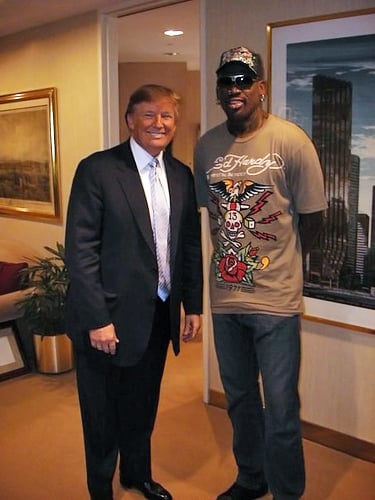 Trump posing with former NBA basketball player Dennis Rodman during Rodman's 2009 participation on Celebrity Apprentice