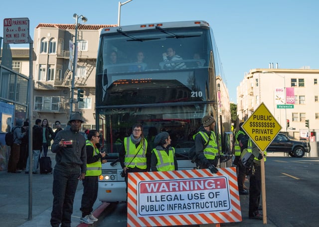 San Francisco activists protest privately owned shuttle buses that transport workers for tech companies such as Google from their homes in San Francisco and Oakland to corporate campuses in Silicon Valley.