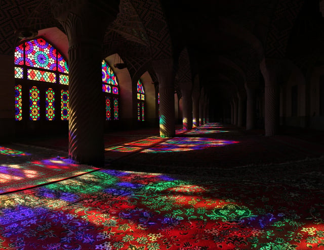 Color effect – Sunlight shining through stained glass onto carpet (Nasir ol Molk Mosque located in Shiraz, Iran)