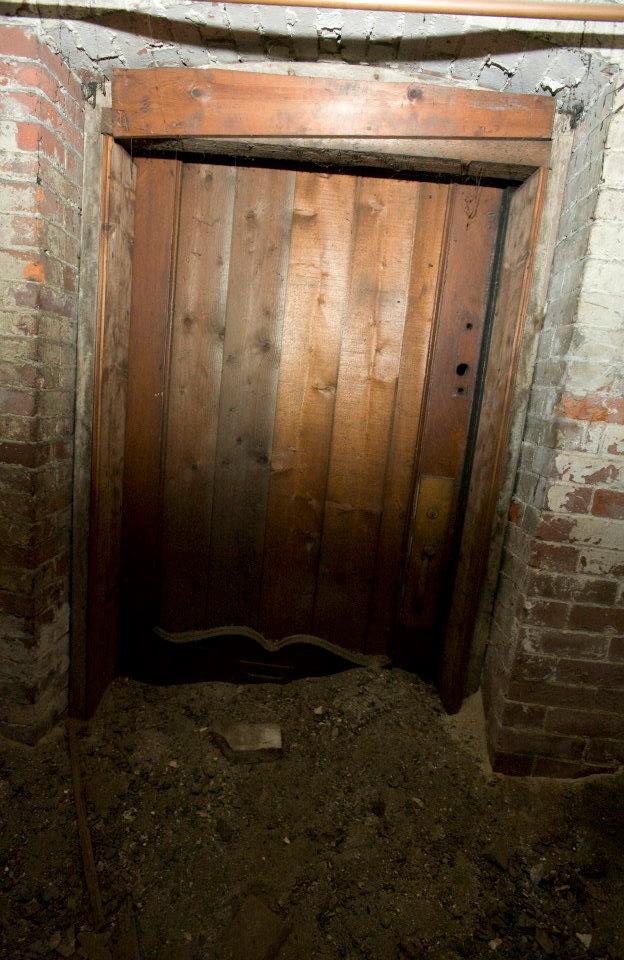 Door to a compartment where runaway slaves would sleep, on the Underground Railroad