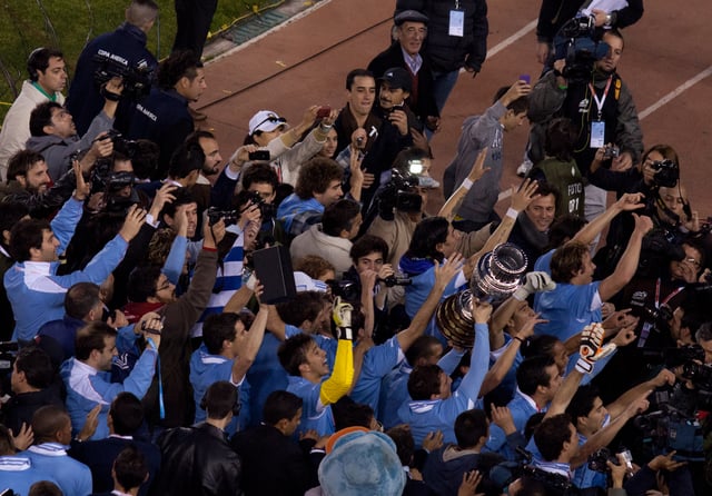 Uruguayan players celebrating their 15th Copa America title.