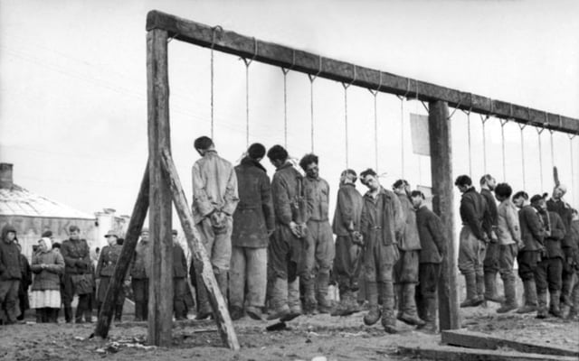Soviet partisans hanged by the German army. The Russian Academy of Sciences reported in 1995 civilian victims in the Soviet Union at German hands totalled 13.7 million dead, twenty percent of the 68 million persons in the occupied Soviet Union.