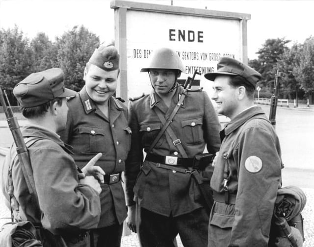 14 August 1961, Erection of the Berlin Wall. GDR borderguards and members of a Combat Groups of the Working Class at the border of the Berlin sector.