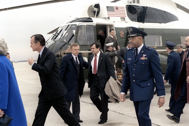Vice President George H. W. Bush and other VIPs wait to welcome the former hostages to Iran home