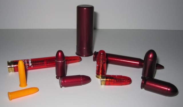 An assortment of snap caps of varying calibers.