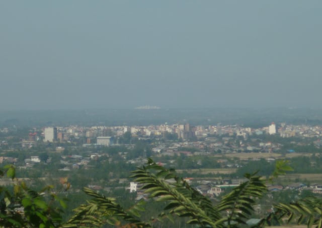 illustration part of town from a hill