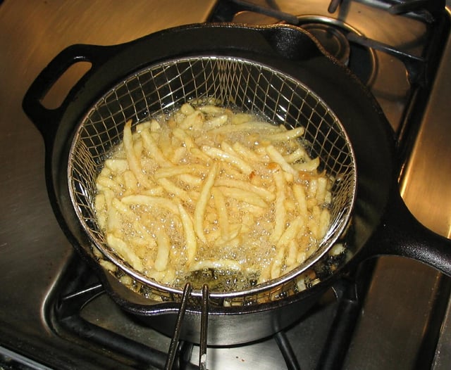 Fries frying in oil
