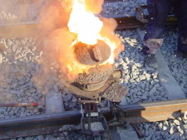 Thermite reaction proceeding in railway welding.