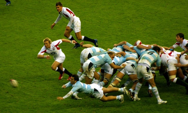 IRB Hall of Fame member Agustín Pichot passes the ball from the back of a scrum.