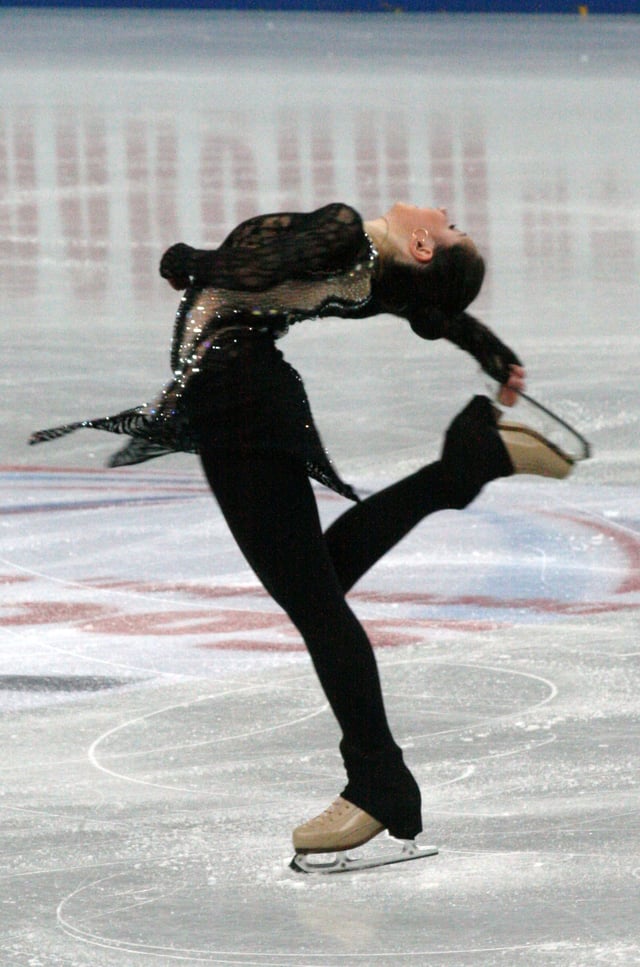 Tuktamysheva performing a Layback spin at the 2012–13 Grand Prix Final
