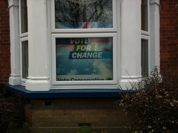 An election sign in a residential property.