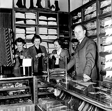 Nurmi in his men's clothing store in Helsinki in 1939