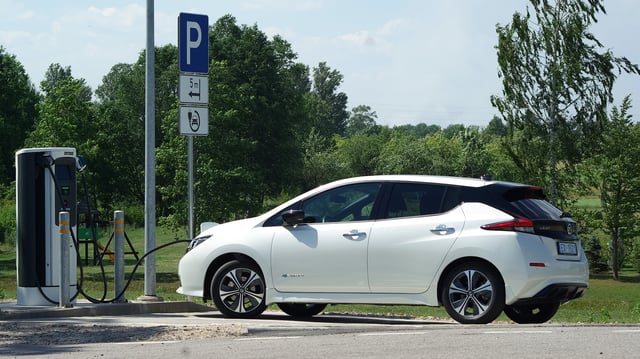 2018 Nissan Leaf at an electric charging station.