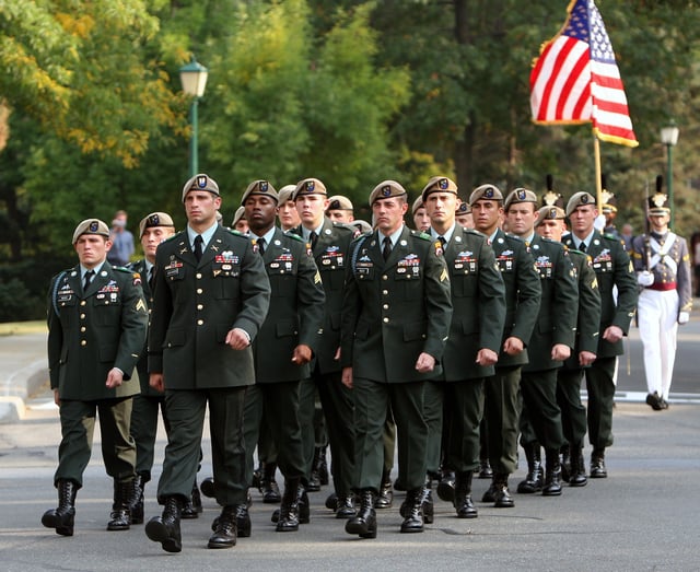 The Ranger Honor Platoon marching in their tan berets and former service uniform