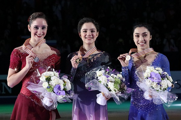 Medvedeva (centre) with Kaetlyn Osmond (left) and Gabrielle Daleman (right) on the 2017 World Championships podium.