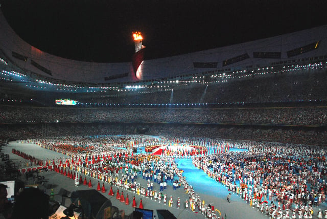 Athletes gather in the stadium during the closing ceremony of the 2008 Summer Olympics in Beijing.