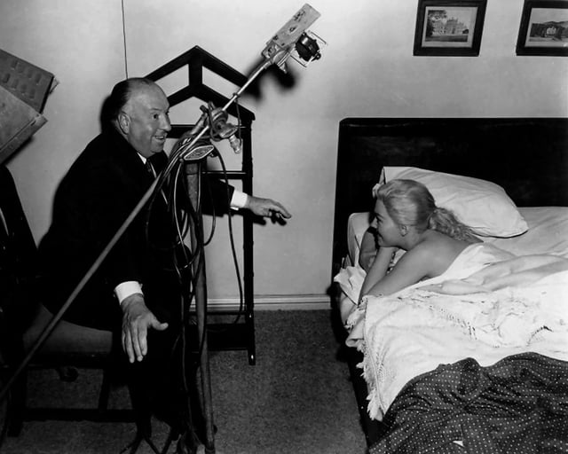 Alfred Hitchcock and Kim Novak on the set of Vertigo (1958)
