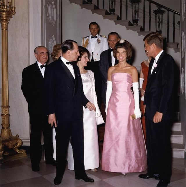 Kennedy, President John F. Kennedy, André Malraux, Marie-Madeleine Lioux Malraux, Lyndon B. Johnson and Lady Bird Johnson prior to a dinner, April 1962. The First Lady is wearing a gown designed by Oleg Cassini