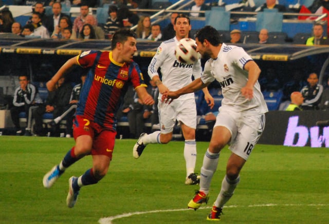 A 2011 Spanish La Liga match between Real Madrid and Barcelona. This fixture, known as El Clásico, is one of the most renowned in sport.