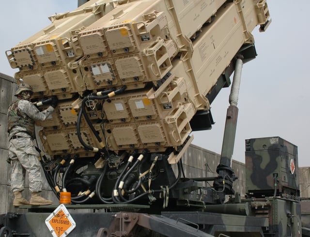 A soldier assigned to the 35th Air Defense Artillery Brigade's 1st Battalion, 43rd Air Defense Artillery Regiment conducting maintenance on a Patriot missile launcher in 2006