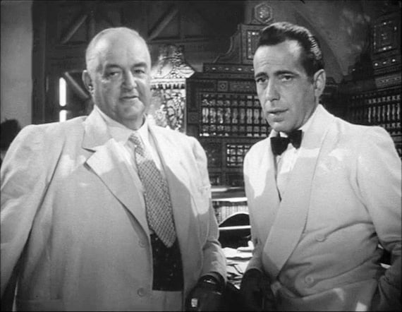 With Sydney Greenstreet in Casablanca (1942), a role that earned Bogart the first of three Oscar nominations