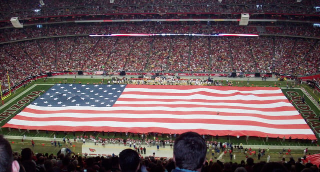 The presentation of the flag and singing of The Star-Spangled Banner before the start of the Packers vs. Cardinals Wild Card Game.